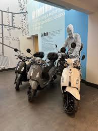 MyCityRides team posing with scooter.